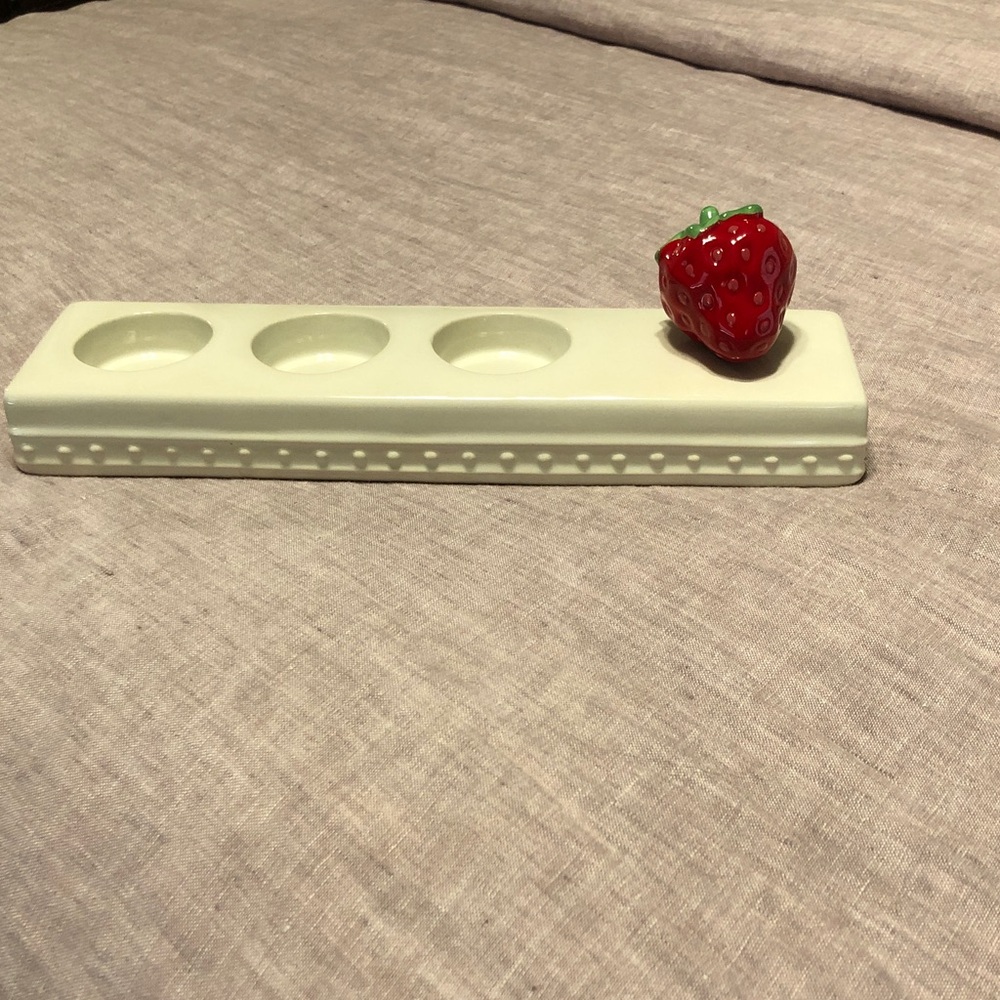 Cream Candle Holder with Red Strawberry Accent.